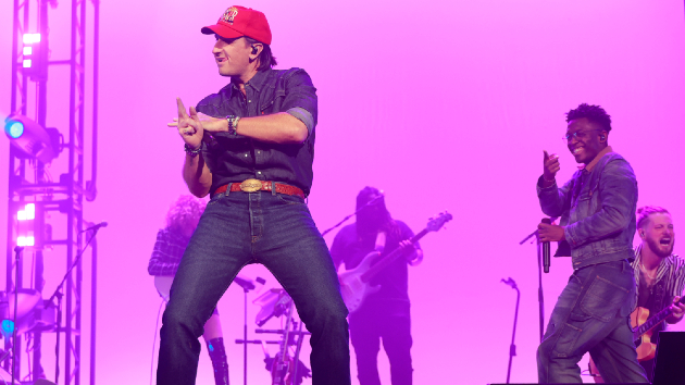 With his fancy footwork fueling Russellmania, Russell Dickerson’s dealing with the pressure