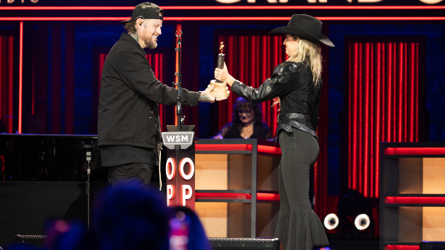 Lainey Wilson officially inducts Jelly Roll into the Grand Ole Opry